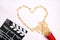 Movie clapper board and popcorn heart on white background with copy space. Valentine`s Day movie concept