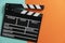 Movie clapper on color background ; film, cinema and video photography concept