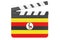 Movie clapperboard with Ugandan flag, film industry concept. 3D rendering