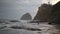 Movie of Crashing Waves with Cloudy Sky and Sandy Beach in Cape Kiwanda along Pacific Ocean in Pacific City Oregon Closeup 1080p