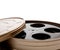 Movie reel canister on white with copy space