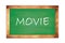 MOVIE text written on green school board