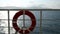 Moving boat with life ring buoy