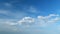 Moving clouds against a blue sky. Weather forecast, climate, atmospheric layer, nature. Timelapse.