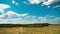Moving Clouds in Blue Sky above Landscape Fields. Timelapse. Amazing Rural valley. Ukraine