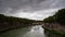 Moving clouds over Ponte Sisto Sisto bridge over Tiber River in Rome