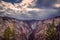 Moving Clouds over Upper Canyon Falls in Yellowstone National Park