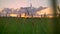 Moving footage of beautiful wheat or rye field with amazing sunset above, pink sky with clouds