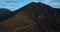 Moving forward aerial view of mediterranean sea Salina volcano mountain.Nature outdoors travel establisher,Italy,Sicily