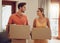 Moving, home and couple holding boxes while looking happy with their choice. Relationship, growth and investing for new