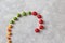 Moving natural organic vegetables for cooking a healthy vegetarian salad on a gray stone background. Stop motion