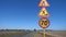 Moving near the road signs signalized about road renovation