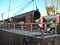 Moving the pipe with a crane on the barge deck. Preparation and assembly of the underwater gas pipeline to hold the workshop lay b