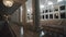 Moving shot interior of empty bright large concerte hall. Big white pillars