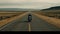 A moving shot of a motorcycle speeding down a long empty road created with Generative AI