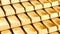 Moving stacks of gold bars, animated background with golden ingots. 3D rendering