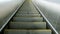 Moving stairs of grey modern escalator. escalator close-up