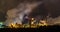 Moving time lapse of night industrial landscape environmental pollution waste of thermal power plant. Big pipes of chemical indust