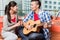 After moving together young man plays love song for his girlfrie
