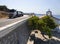 A moving truck and View of the Cycladic style Greek Church of Evia in Greece on a Sunny day