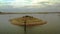 Moving view above the lake Kariba in Zimbabwe near Victoria Falls, small island with the group of Hippopotamus