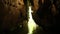 Moving Through Water-Filled Cave Toward Bright Light Outside