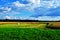 Mowed meadow and secured hay bales.