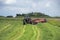 Mowing the Hay in a Road Ditch