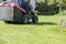 Mowing the lawn with tractor