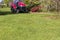 Mowing the lawn with tractor