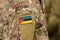 Mozambique flag on soldiers arm. Mozambique troops collage