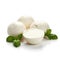 mozzarella balls and mint leaves isolated on white background