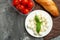 Mozzarella with basil leaves - fresh ingredients for Bruschetta, with cherry tomatoes and French baguette with copy space on a dar