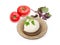 Mozzarella cheese on glass saucer, tomatoes and potherb