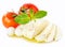 Mozzarella with tomatos and basil leaves isolated
