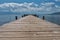 Mpty wooden jetty on the lake shore