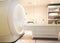 MRI scanner or Magnetic resonance imaging scanner .