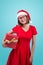 Mrs. Santa. Beautiful young asian woman in santa`s hat holding a