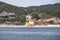 Mt Athos - Panoramic view from boat tour on Ouranoupolis town nd ancient Tower of Ouranoupolis on peninsula Mount Athos