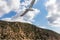 Mt Athos - White seagull flying along the coastline of peninsula Athos, Chalkidiki, Central Macedonia, Greece, Europe