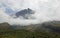 Mt Egmont volcano in scarf of clouds