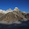 Mt Everest and other high mountains surrounded by a sea of fog