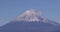 Mt.Fuji behind the blue sky in winter telephoto shot