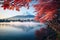 Mt Fuji with red maple leaf at Kawaguchiko lake in Japan, Colorful Autumn Season and Mount Fuji with morning fog and red leaves at