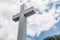 Mt. Helix Cross with Foliage and Cloudy Blue Sky