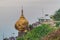 MT KYAIKTIYO, MYANMAR - DECEMBER 11, 2016: Crowds of pilgrims visit Mt Kyaiktiyo Golden Rock , Myanm