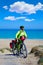 MTB Biker Bicycle touring on a beach with pannier