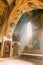 Mtskheta, Georgia. Sun ray shining in church. Fresco, Frescoes. Icons, of Shio-Mgvime Monastery. interior of Upper