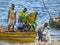 MTWARA, Tanzania - December 3, 2008: Unknown men fishermen sailed from fishing on the shore.
