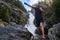 Muay thai fighter training by the waterfall